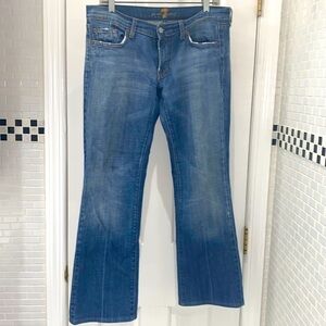 7 for All Mankind vintage boot cut denim. Distressed pockets. EUC. Size 30.